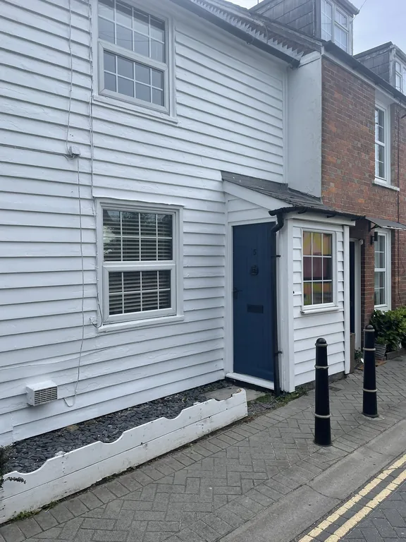 Completed weatherboard repair and repaint on a Grade II listed property on Bridewell Lane, Tenterden